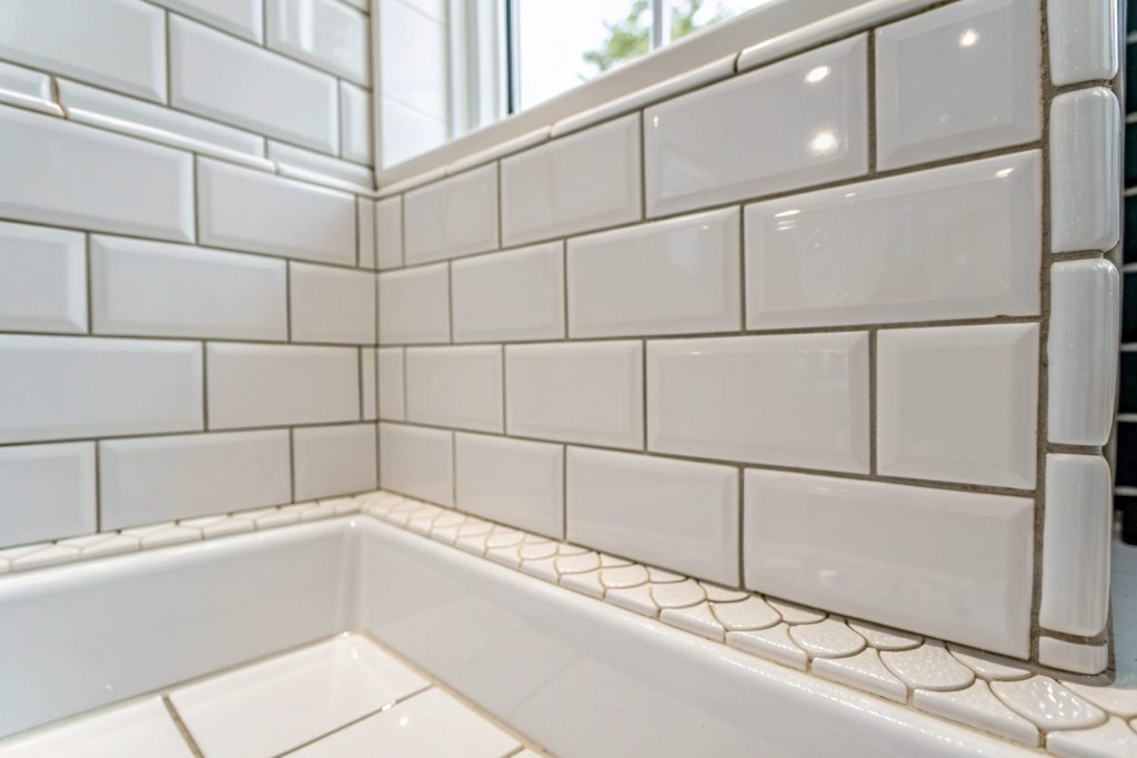 Well-maintained shower grout and silicone sealing preventing water leaks