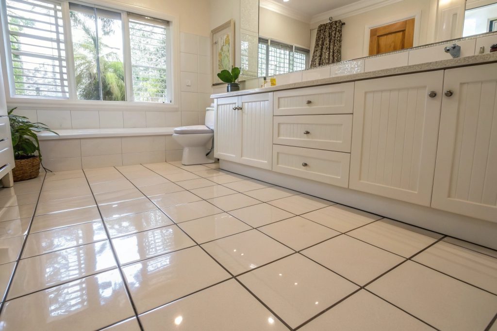Newly installed bathroom floor tiles in Hobart home