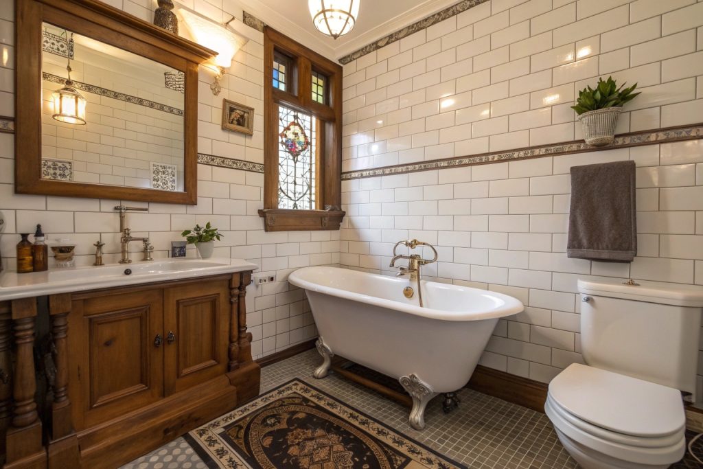 Victorian-style bathroom with period fixtures and traditional tiles
